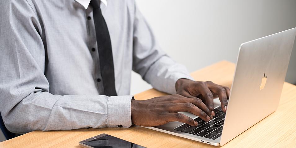 Adult student working on laptop